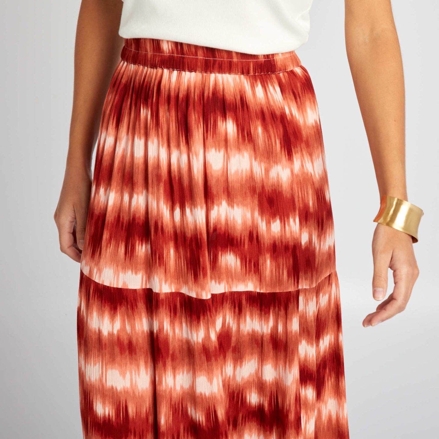 تنورة طويلة من الكريب المحبوك باللون الوردي