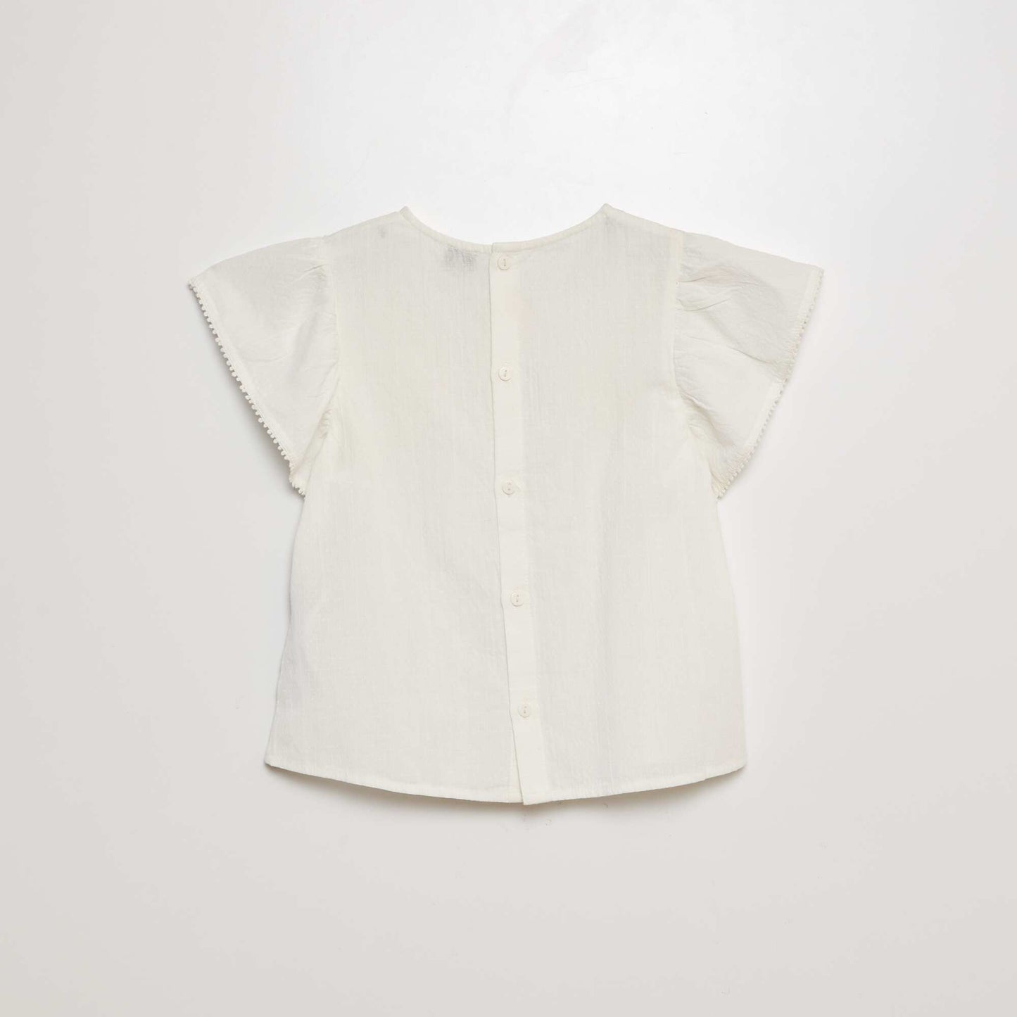 بلوزة بأكمام قصيرة مطرزة باللون الأبيض