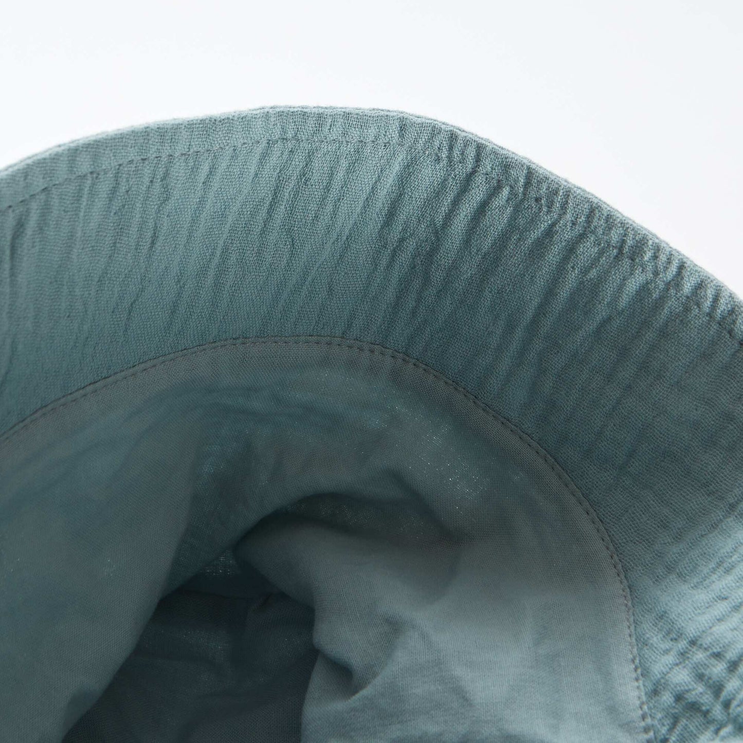 قبعة دلو شاش قطنية مطرزة بالشمس باللون الأزرق