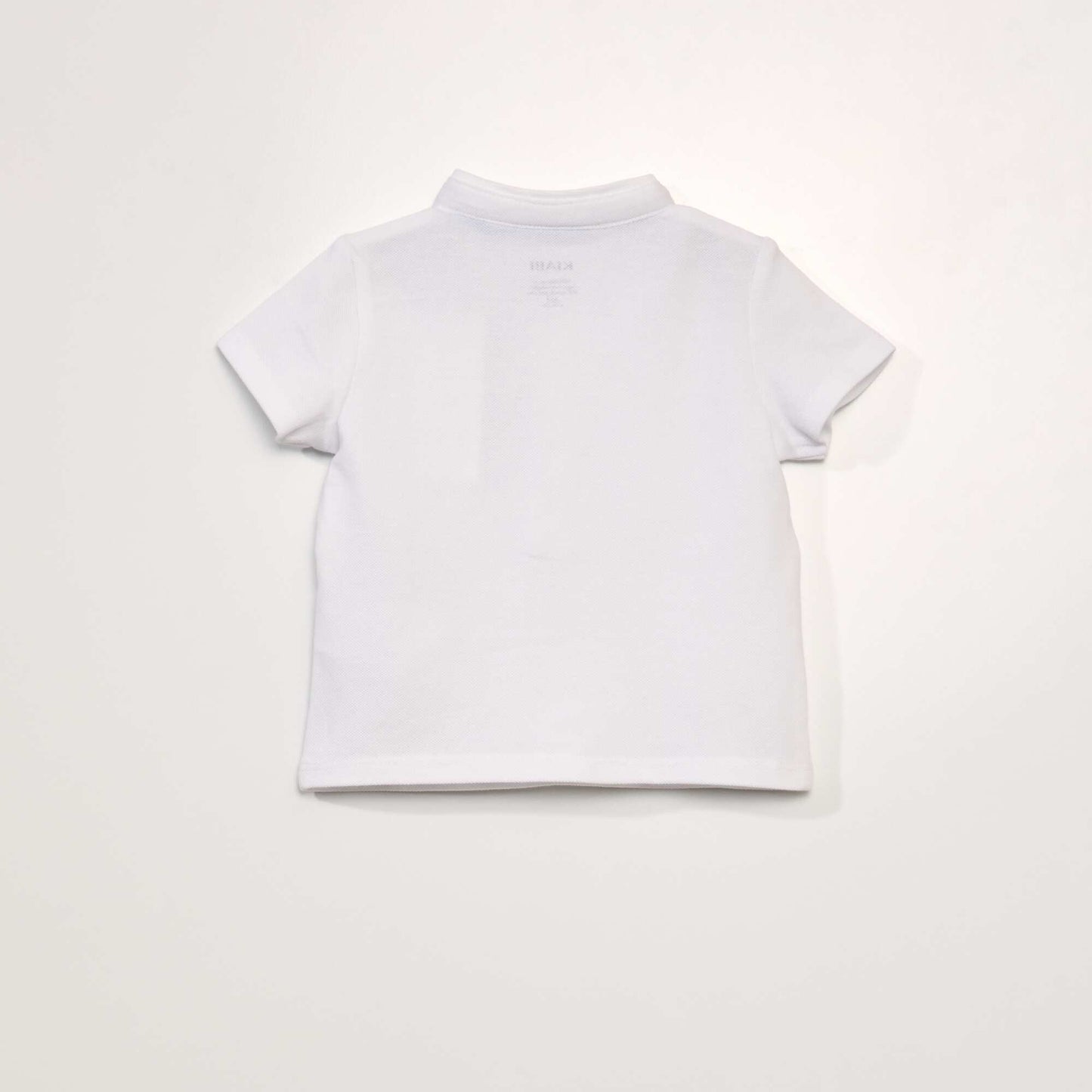 Piqué knit polo shirt with mandarin collar white