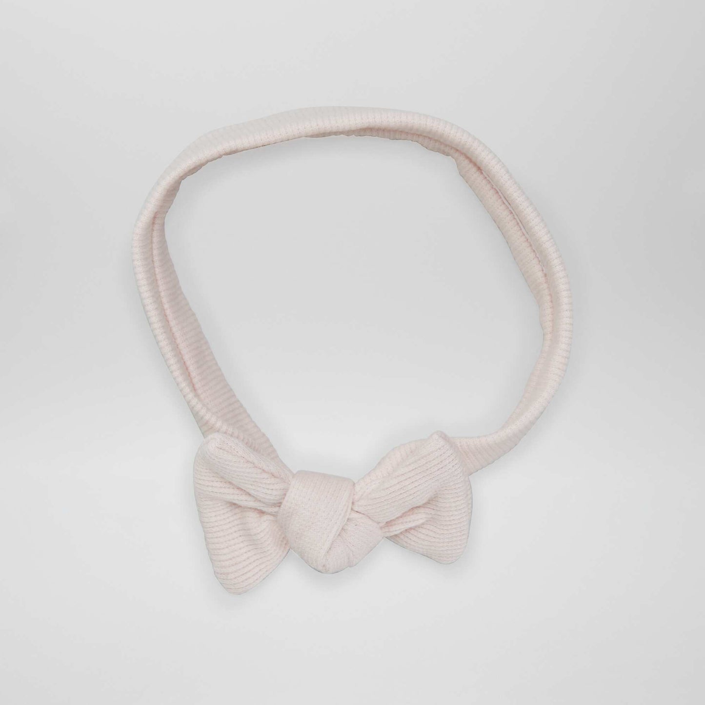 عصابة رأس جيرسيه مضلعة باللون الوردي