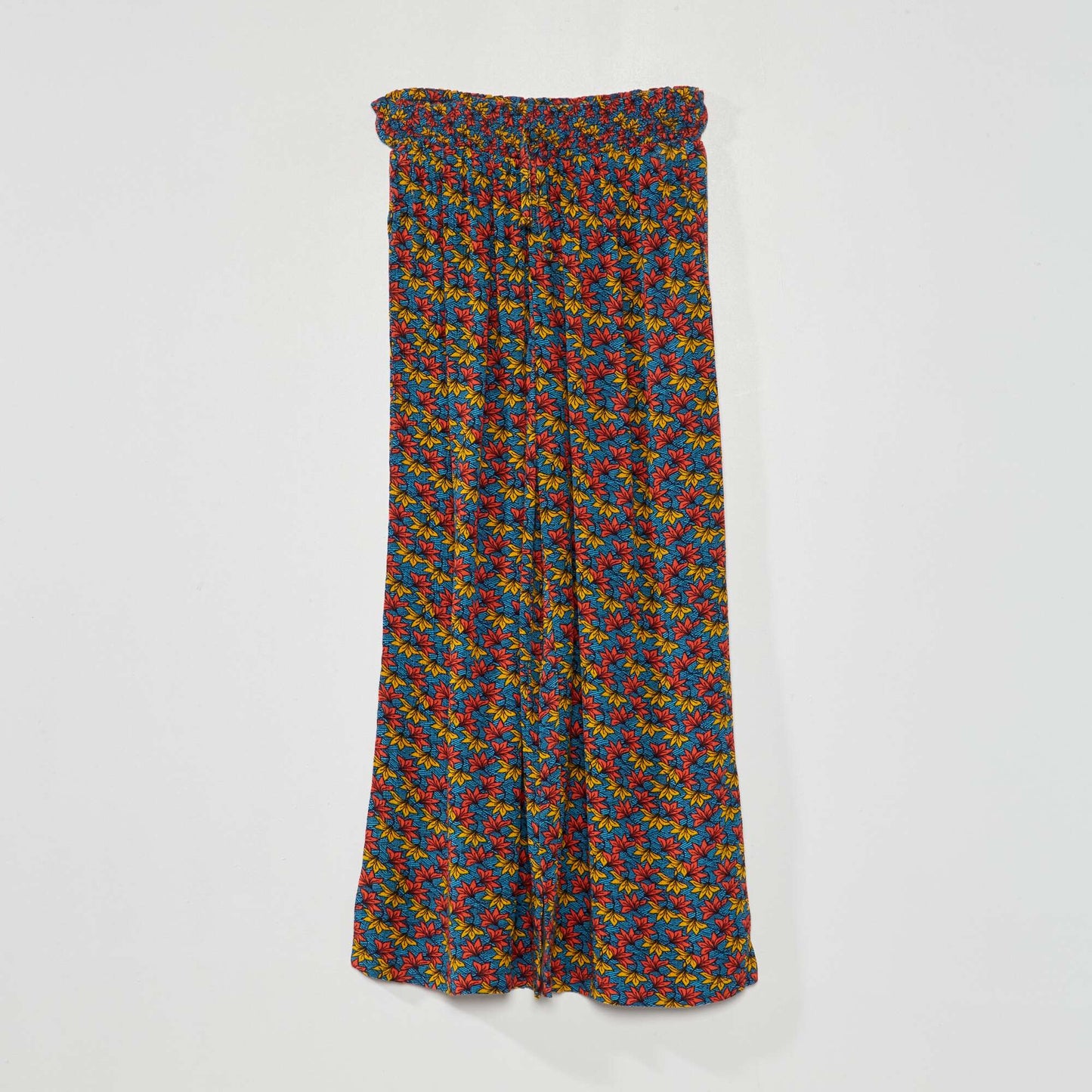Flowing wax print crepe knit trousers ORANGE