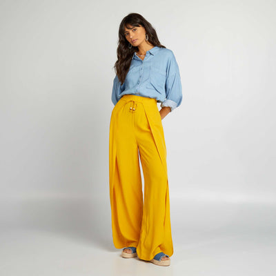 بنطلون انسيابي واسع الساقين برتقالي