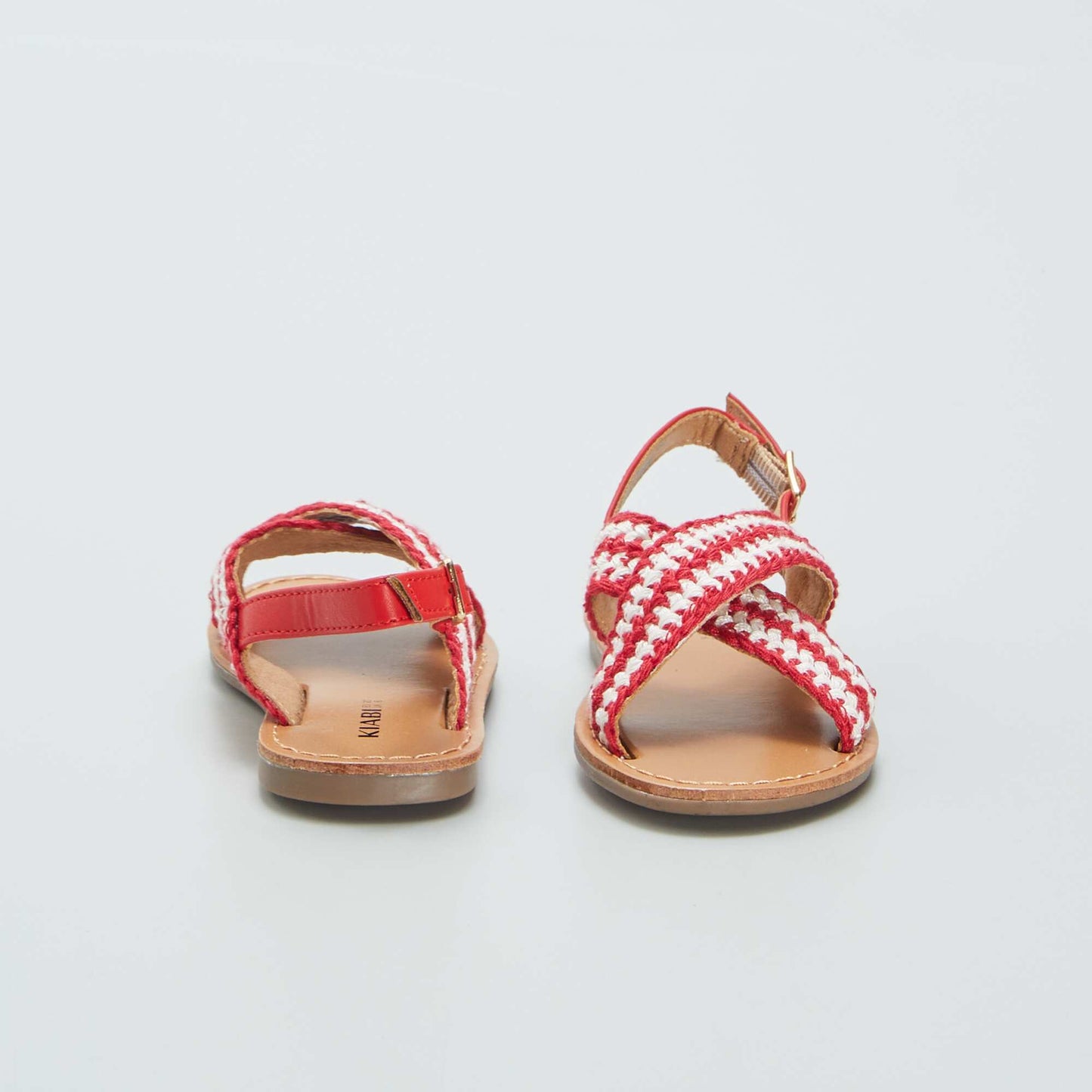 Flat sandals with cross-over straps RED