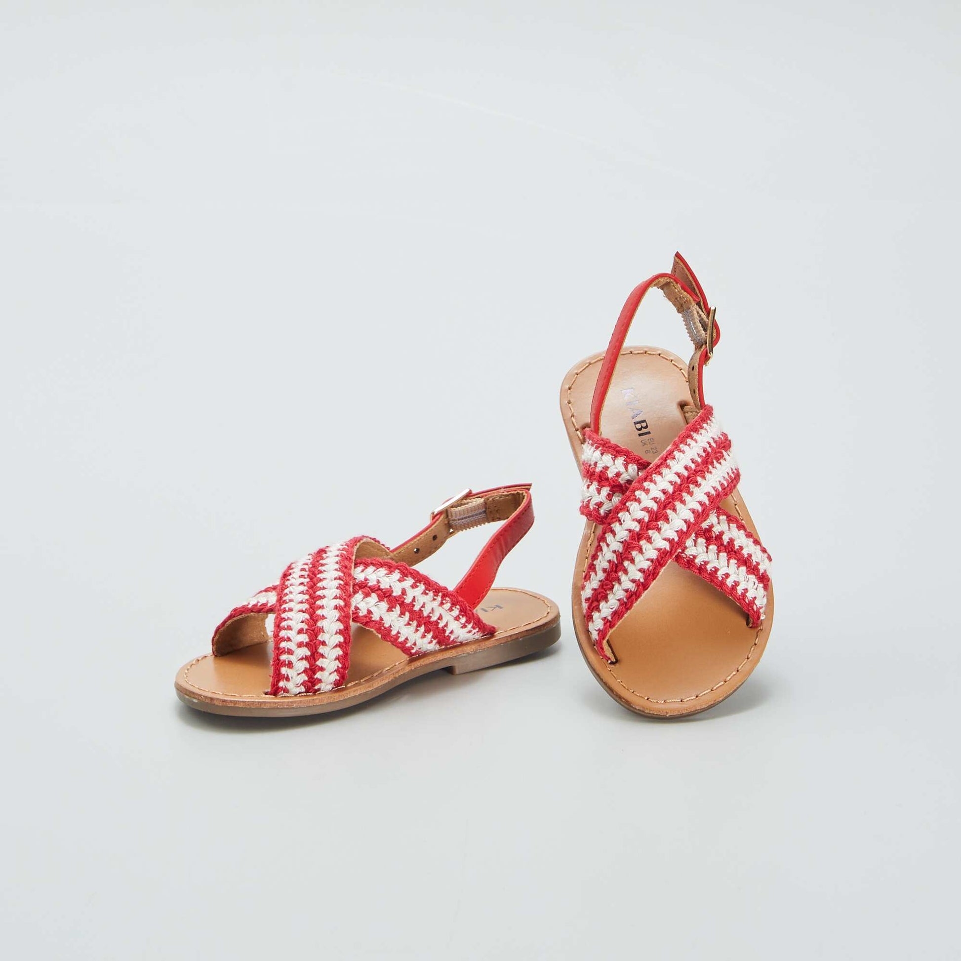 Flat sandals with cross-over straps RED
