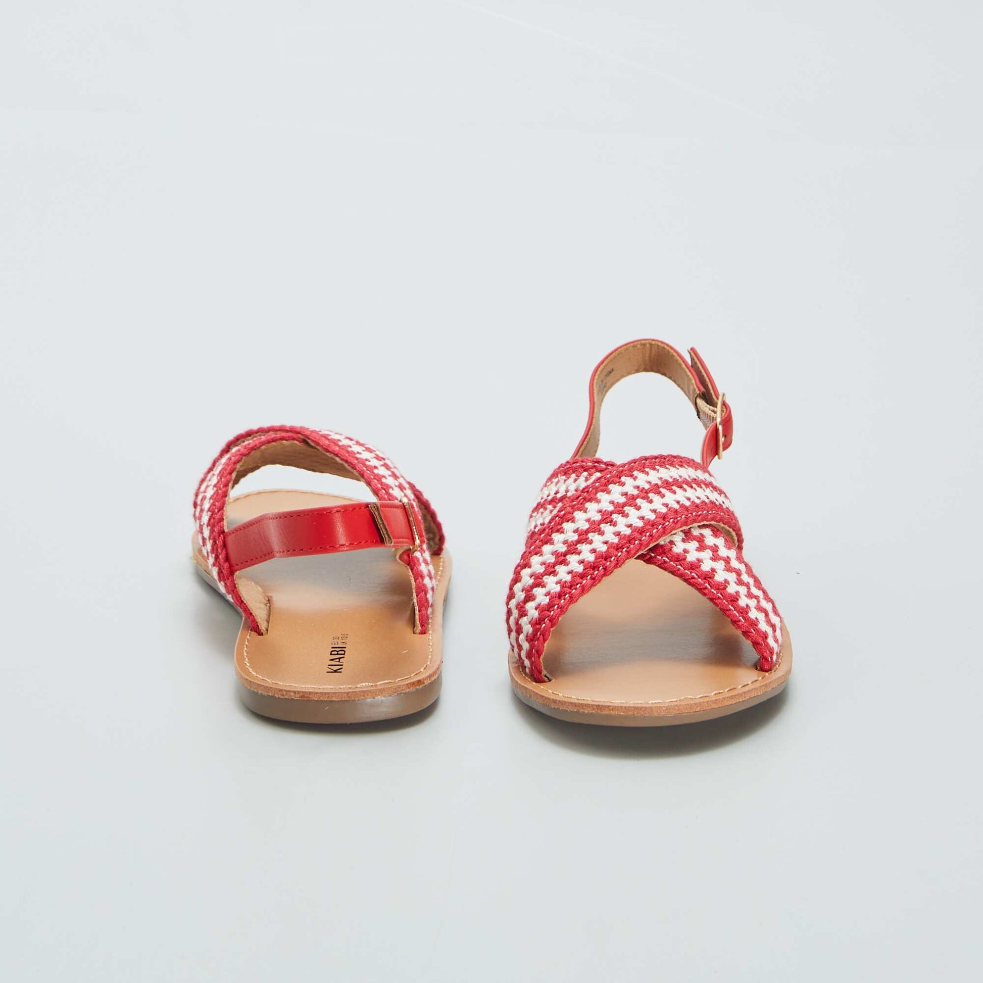 Flat sandals with cross-over straps RED