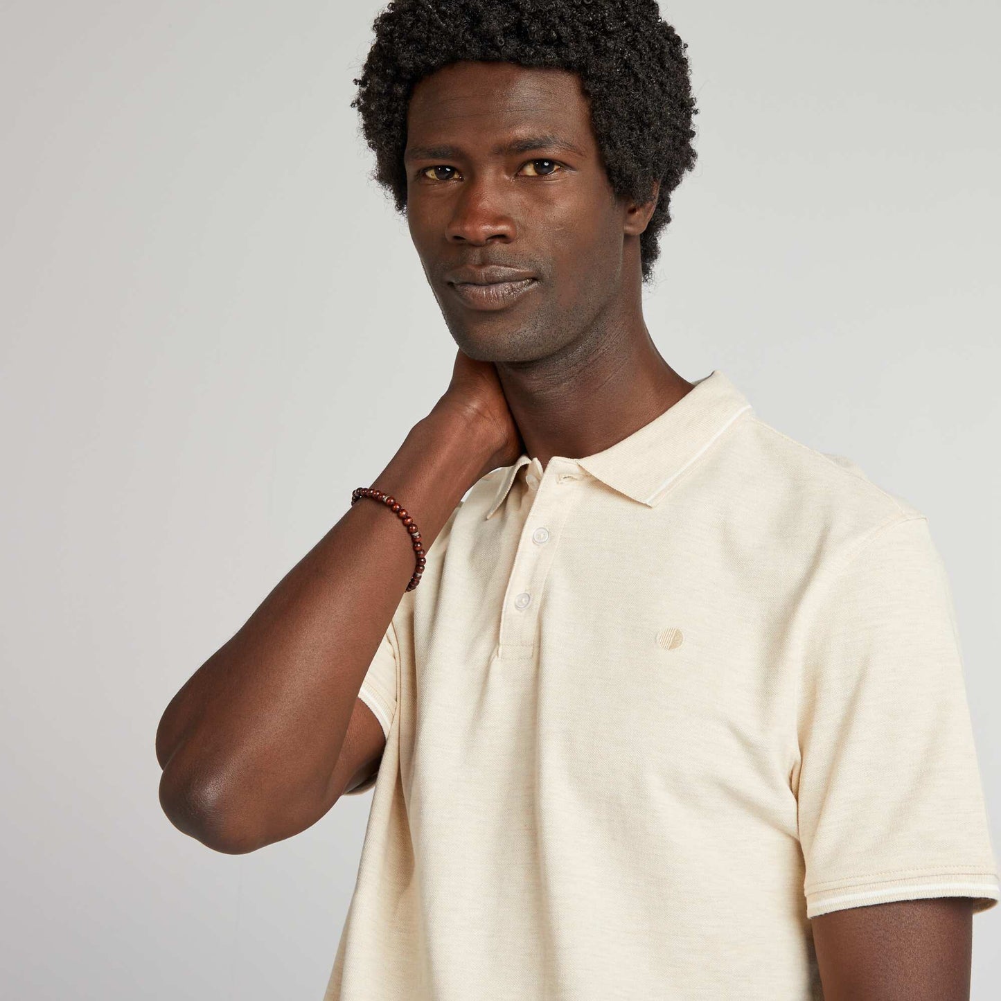 Cotton piqué polo shirt with embroidery on the chest BEIGE