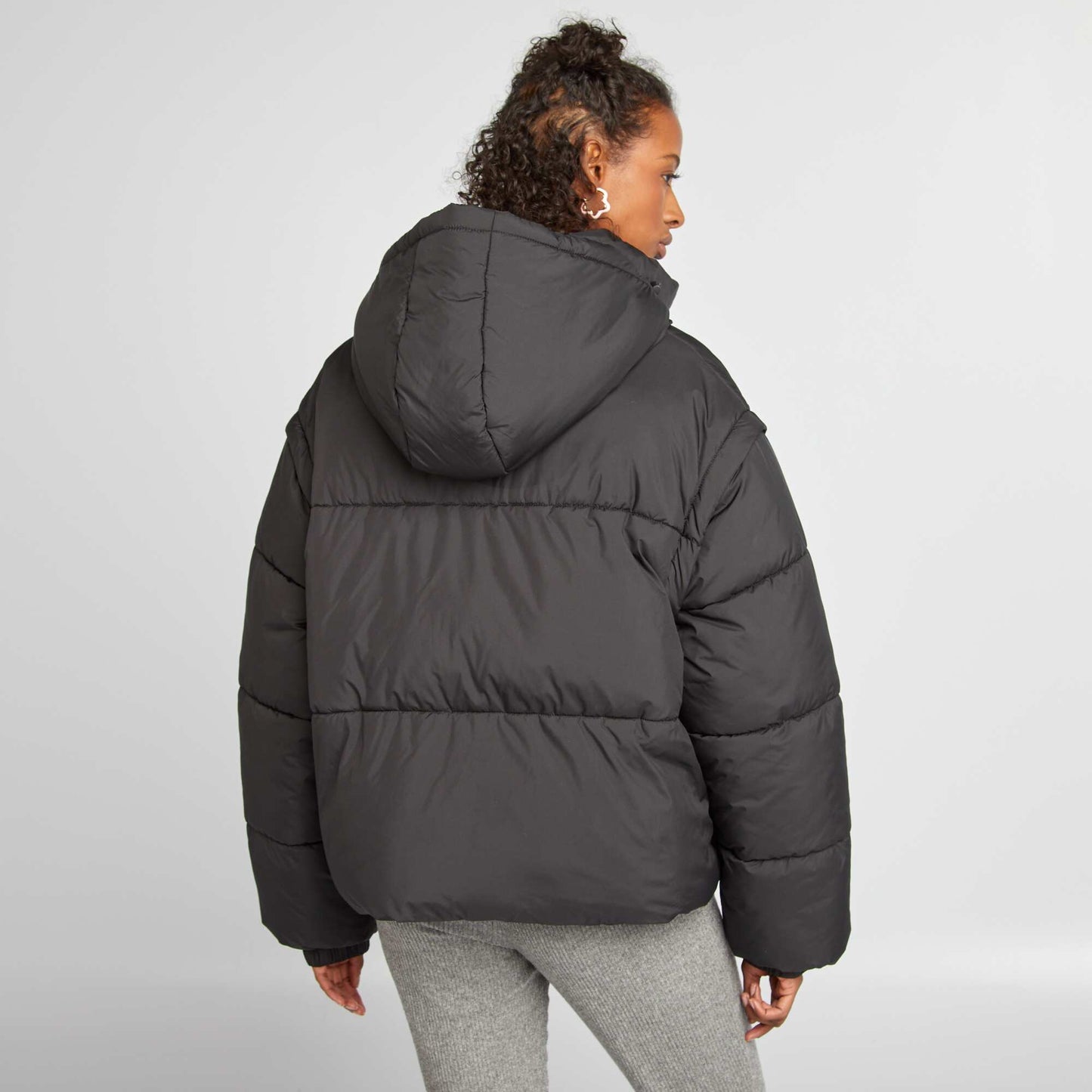 Puffy padded jacket with detachable sleeves and hood black