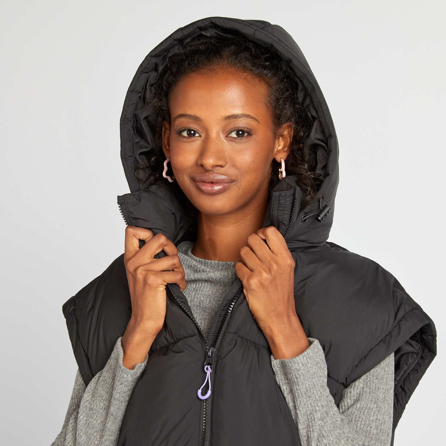 Puffy padded jacket with detachable sleeves and hood black