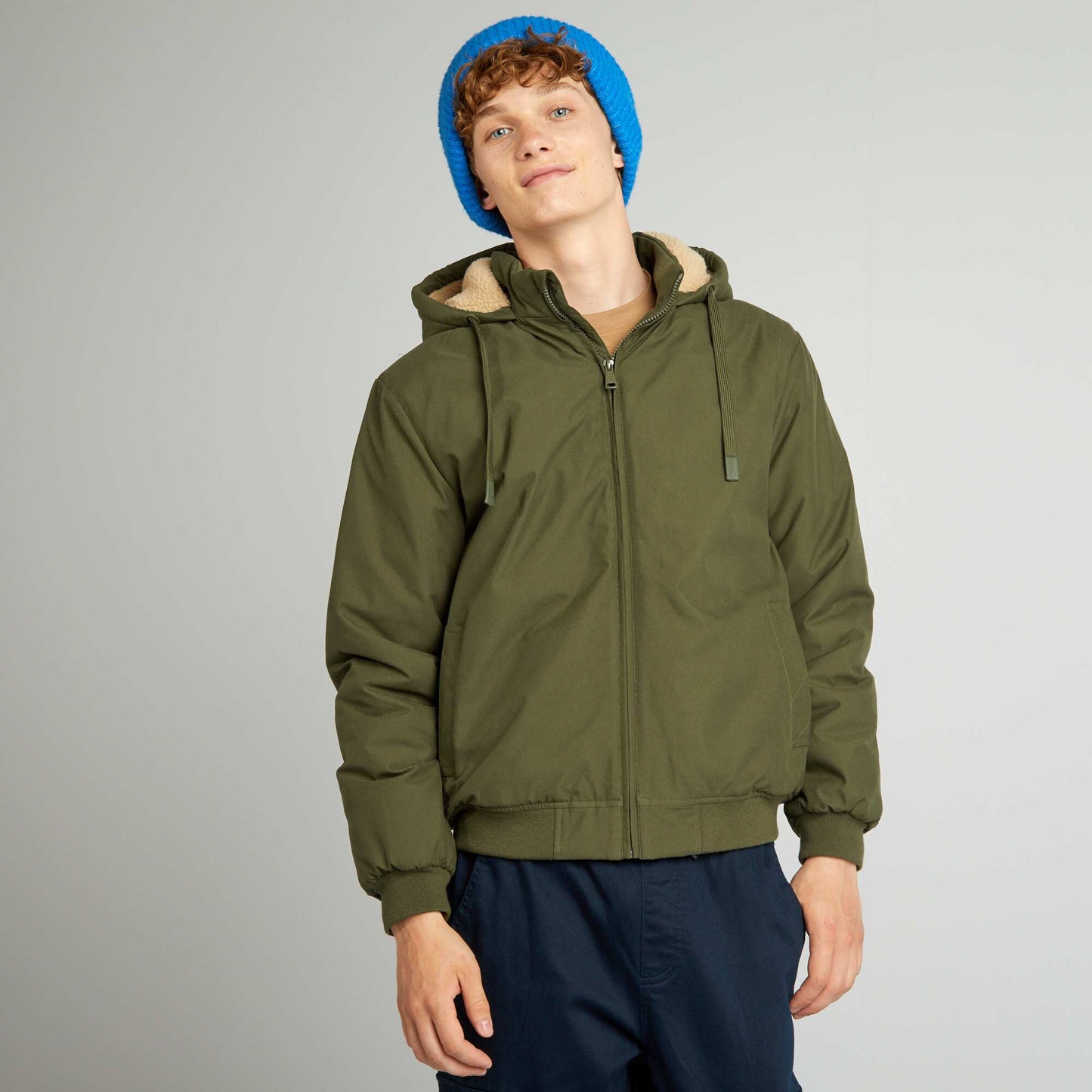 Warm jacket with Sherpa-lined hood GREEN