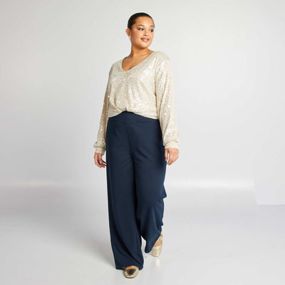 تي شيرت بأكمام طويلة مطرز بالترتر أصفر