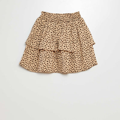 تنورة قصيرة مكشكشة ومطبوعة باللون البيجي