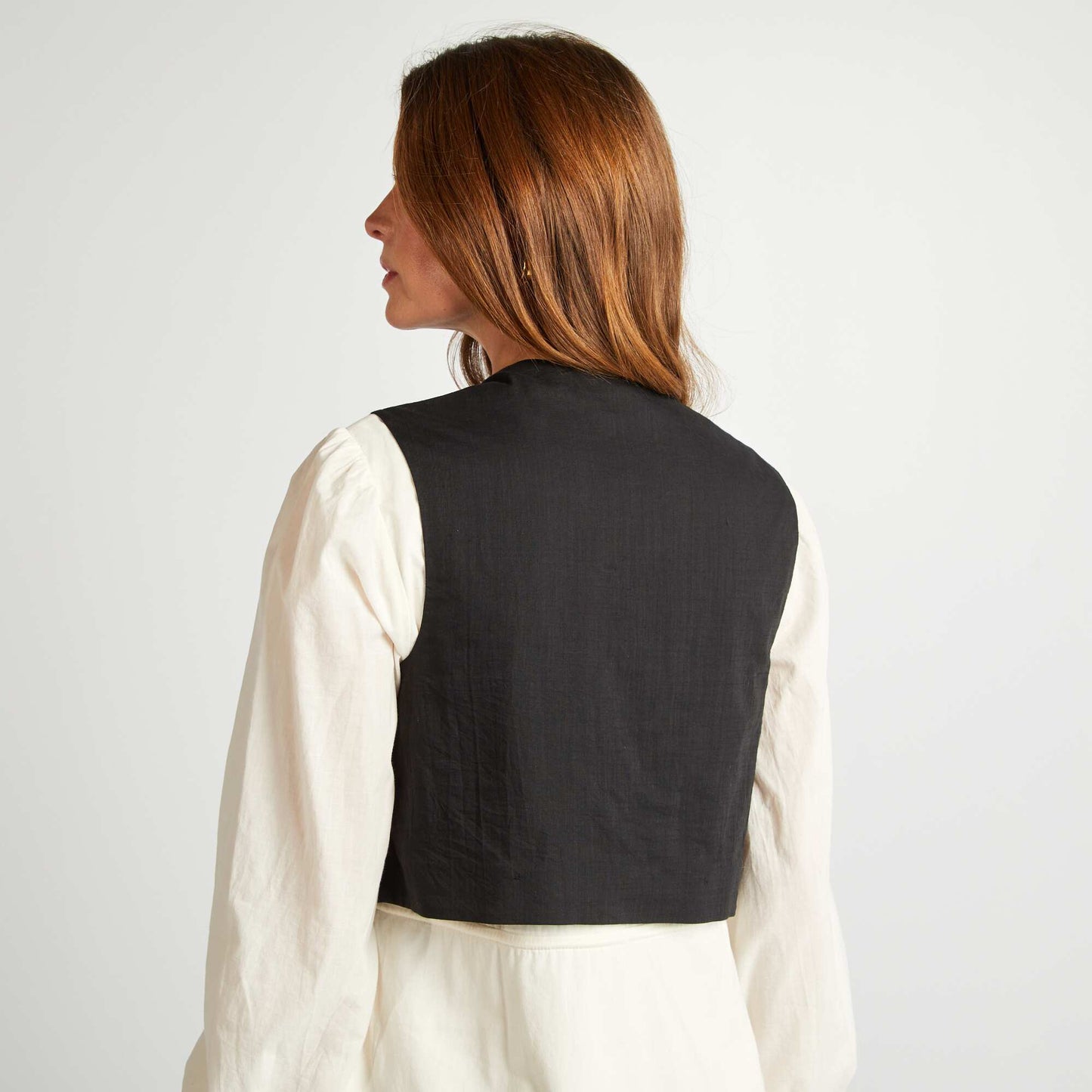 Sleeveless jacket with stud pattern BLACK