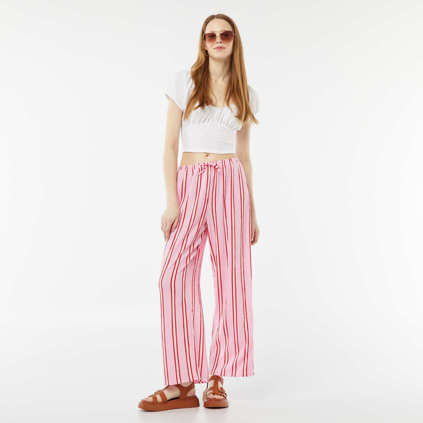 بنطلون واسع الساقين محبوك من نسيج الوافل باللون الوردي