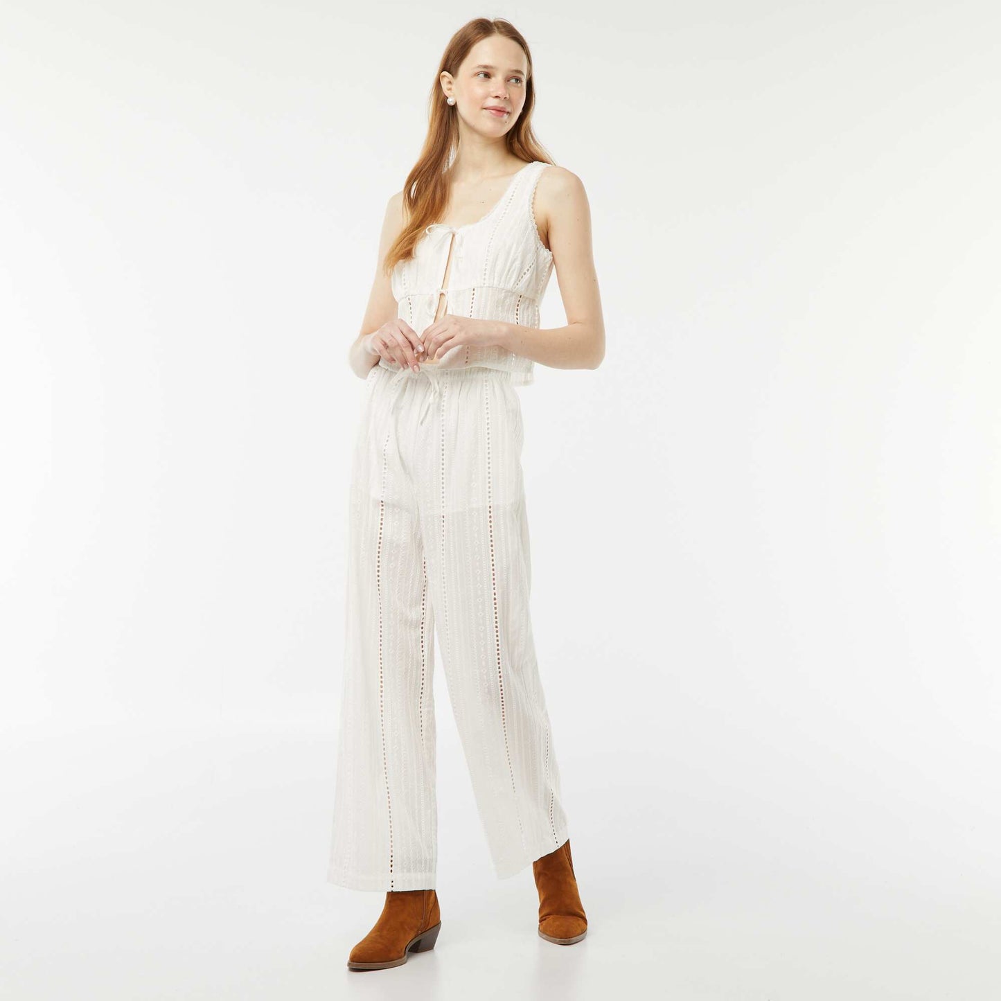 A lightweight sleeveless blouse with tie fastening and broderie anglaise WHITE