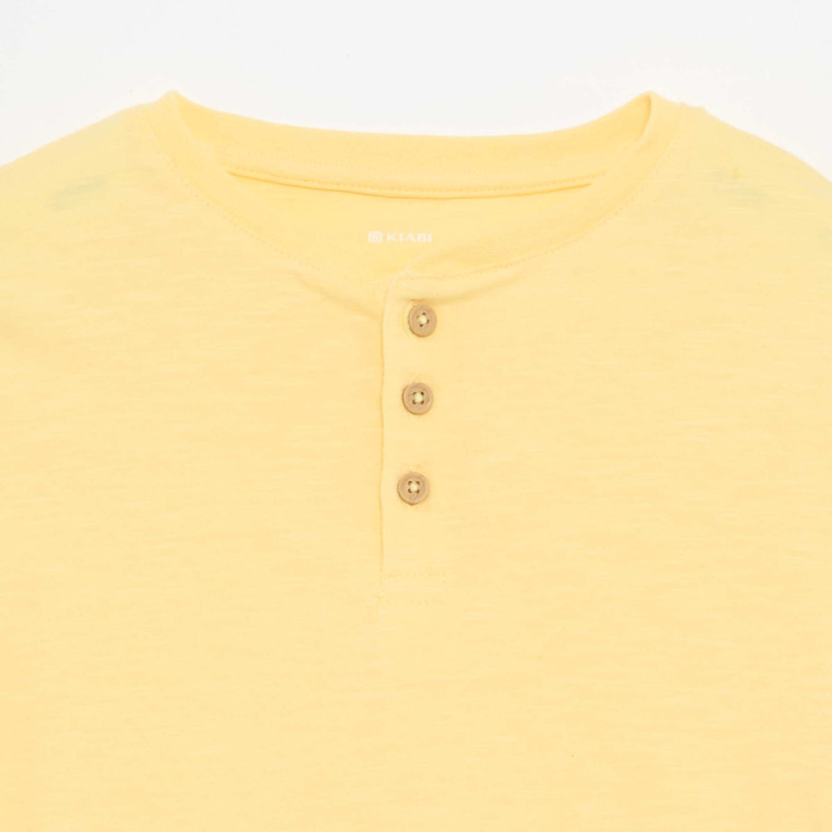 تي شيرت بياقة هنلي أصفر