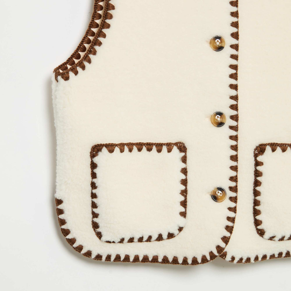 سترة بدون أكمام من جلد الغنم الصناعي، لون بيج