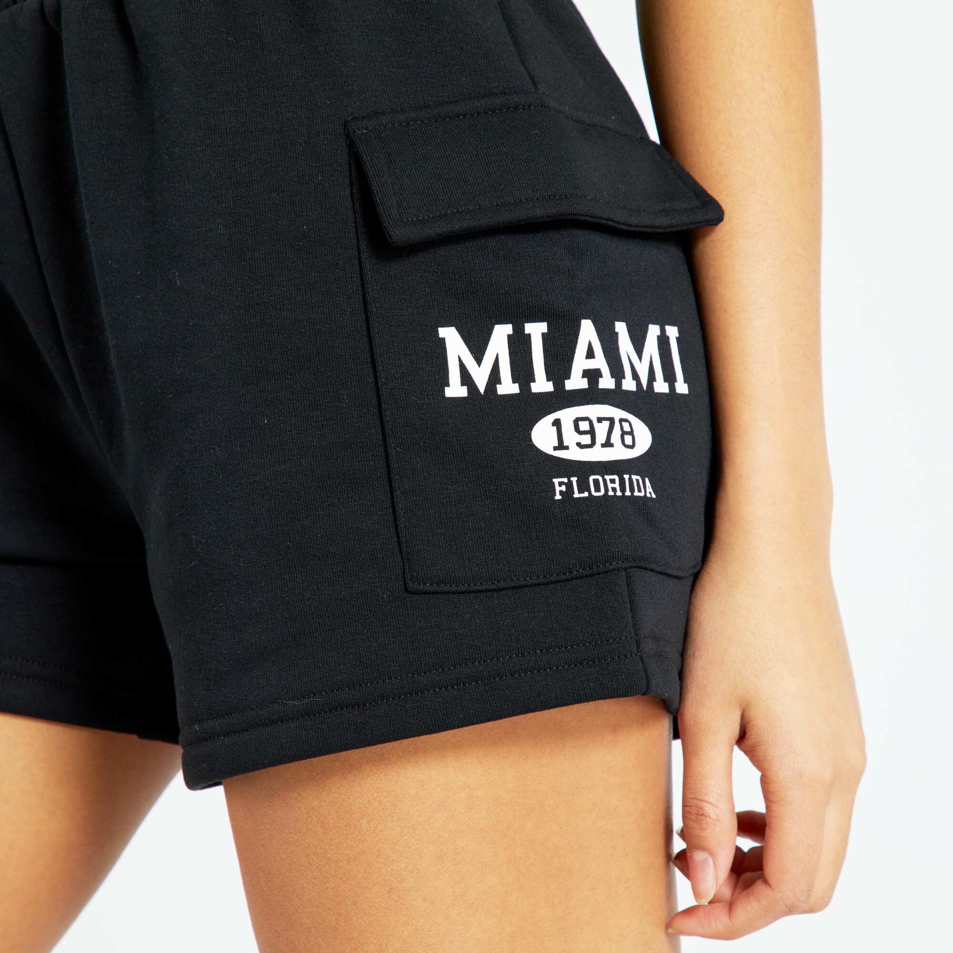 Sweatshirt fabric shorts with flap pockets BLACK