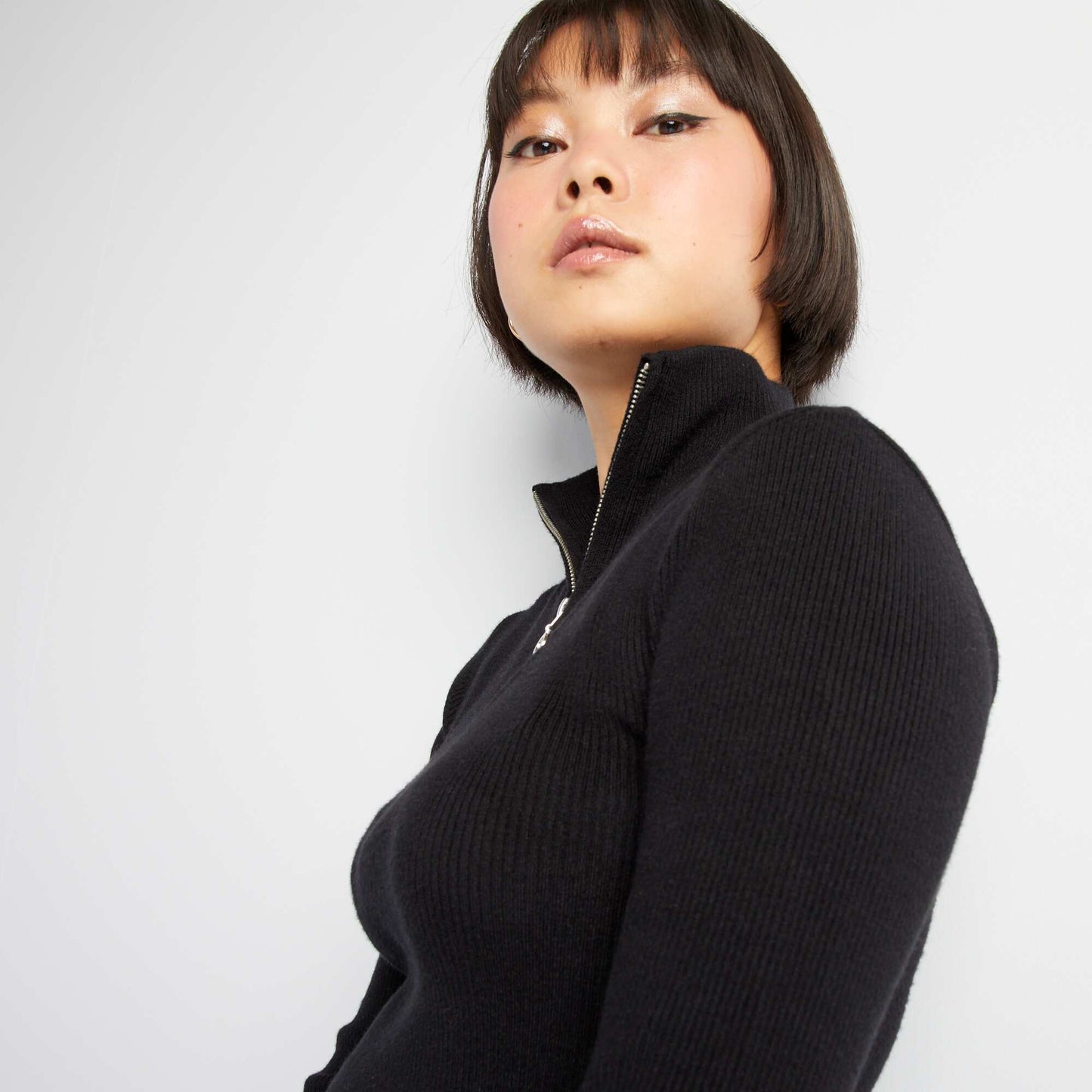 Short ribbed knit dress with high zipped neck black