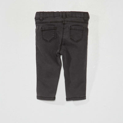 جينز مطاطي بقصة ضيقة وخصر قابل للتعديل أسود