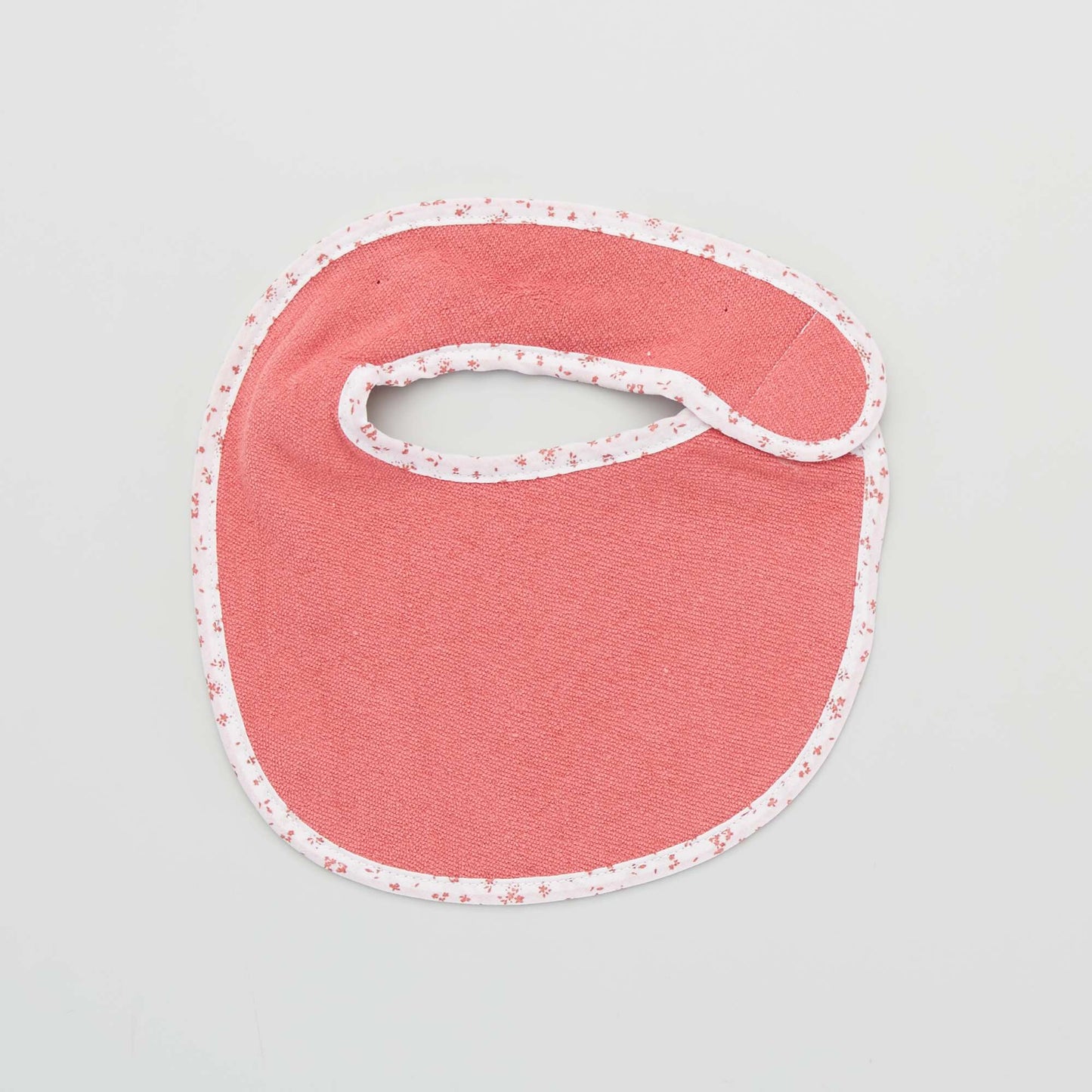 Pack of 7 towelling bibs with hook and loop fastening PINK