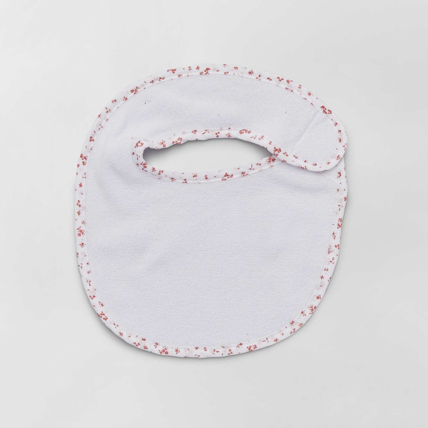 Pack of 7 towelling bibs with hook and loop fastening PINK