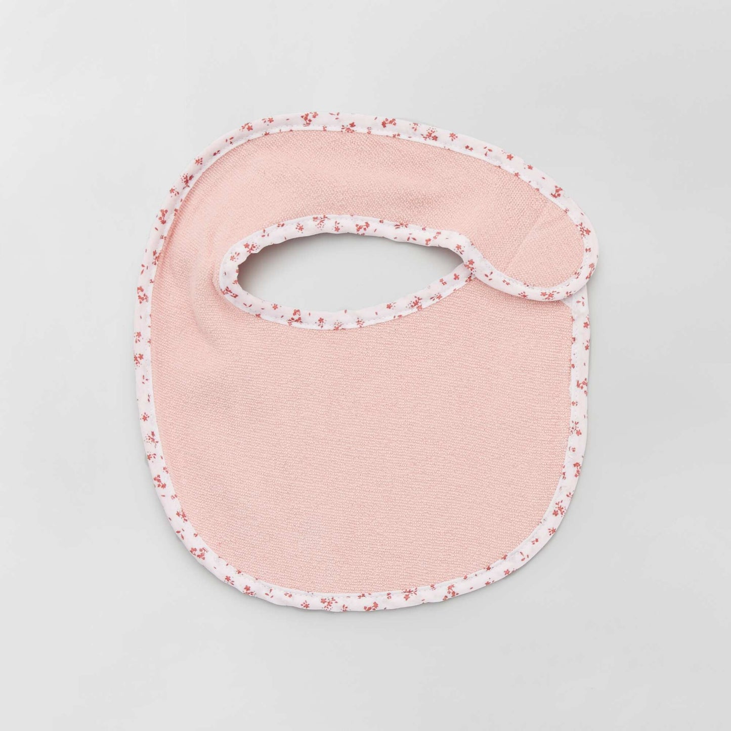 Pack of 7 towelling bibs with hook and loop fastening PINK